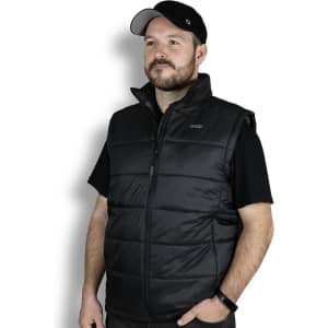 A man wearing a black puffer vest, featuring a zip front and a collar, with a logo on the upper left.