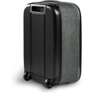 A medium wheeled suitcase in dark green fabric and black hard shell, featuring a logo.