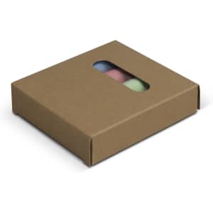 A brown cardboard box containing jumbo sidewalk chalk in pink, blue, and green. The box has a clear window.