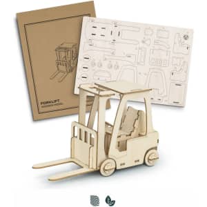 A wooden model of a forklift in natural wood colour, accompanied by a flat pack of model pieces.