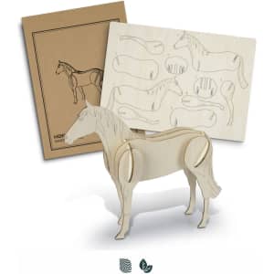A wooden model of a horse in natural colour, with assembly templates displayed behind it.
