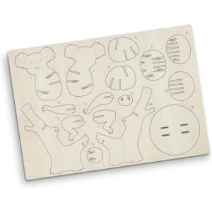 A wooden puzzle featuring koala shapes and tree branches, crafted from light-coloured wood, with a logo present.