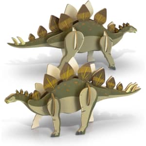 A wooden model of a stegosaurus in shades of green and brown, featuring detailed spikes and a layered design.
