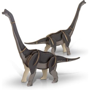 A wooden model of a Brachiosaurus features dark grey and beige colours, showcasing its long neck and tail.