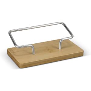 A bamboo business card stand with a silver metal holder, featuring a sleek and modern design.