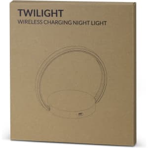 A brown cardboard box featuring a sketch of a circular wireless charging night light with a handle.