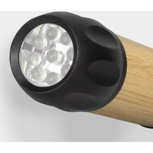 A bamboo torch with a black plastic end featuring multiple LED lights. It has a simple, natural design.