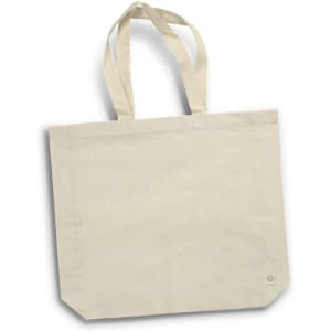 A cream-coloured tote bag made from recycled cotton, featuring two sturdy handles and a branding logo.
