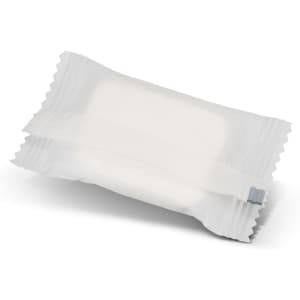 A small, white, compressed towel packaged in a clear wrapper with a logo.