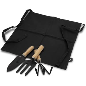 A black gardening apron with three tools: a trowel, a cultivator, and a hand rake, all with wooden handles.