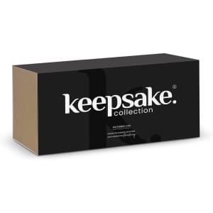 A black and brown box with 'keepsake' branding, containing a watering can from the Keepsake collection.