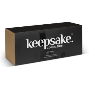 A black box with branding for a "Keepsake Herb Planter," featuring a minimalist design and a sleek appearance.
