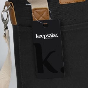 A drink bottle cooler bag in dark grey with tan accents and a tag featuring a logo.