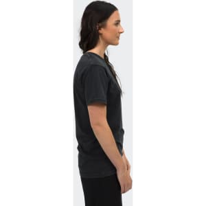 A faded unisex T-shirt in dark grey, displayed on a model from the side. Features a brand logo.