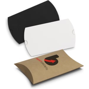 A small pillow box in black, white, and brown, featuring a logo on the brown box.