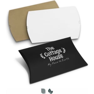 A set of three extra large pillow boxes in black, white, and brown, featuring a logo on the black box.