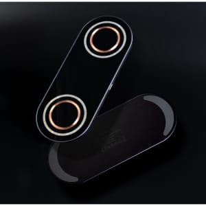 A sleek black wireless charger with dual charging pads, featuring rose gold accents and a minimal design.