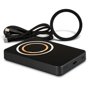 A black wireless charging power bank with a circular charging area, USB cables included. Features one logo.