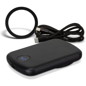 A black wireless charging power bank with a cable and a circular charging pad. It features a logo.