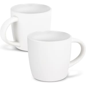 A mocha coffee mug in a two-tone design featuring a smooth white exterior and a contrasting inner colour.
