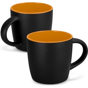 A coffee mug featuring a matte black exterior and a glossy orange interior, with a handle and a logo.