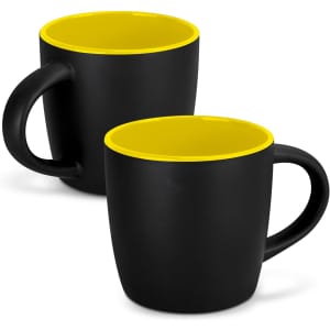 A two-tone coffee mug featuring a black exterior and bright yellow interior, with a rounded handle.
