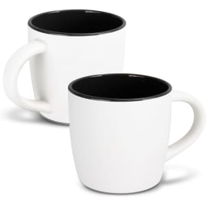 A two-tone coffee mug featuring a white exterior and a black interior, with a smooth handle and a logo.