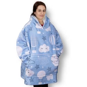A blue blanket hoodie with cloud and balloon designs, featuring a large hood and pockets.
