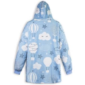 A blue blanket hoodie featuring cloud and hot air balloon patterns, with a hood and long sleeves. It has a logo.