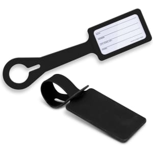 A black silicone luggage tag with a large identification area and a loop attachment. It features a smooth, minimalist design.