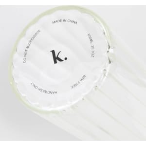 A drink bottle in clear glass with a circular base, featuring a logo and a capacity of 810ml.