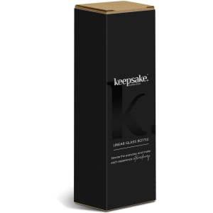 A drink bottle in a sleek black box featuring a logo, designed for keeping beverages.