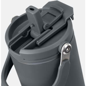 A grey travel mug with a secure lid and a handle, featuring a logo on the side.