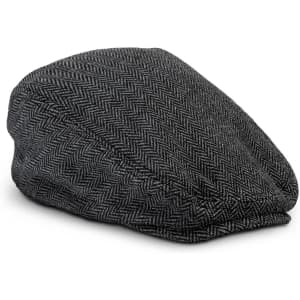 A grey herringbone-patterned flat cap with a rounded shape, featuring a subtle branding logo.