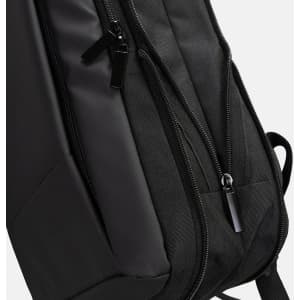 A black Kaden Soft Touch Backpack with smooth zippers and a sleek design. It features a logo on the side.
