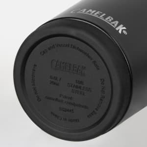 A drink bottle with a black exterior, featuring a stainless steel base and an engraved logo.