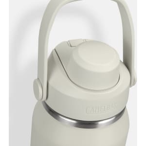 A drink bottle in a light grey colour with a stainless steel body and a secure lid featuring a handle.