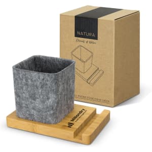 A bamboo phone stand desk caddy features a grey felt container and comes with an eco-friendly cardboard packaging.