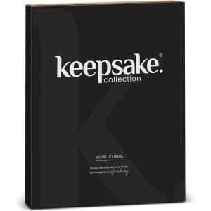 A black recipe journal with a sleek design, featuring a logo and promotional text on the cover.