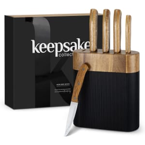 A knife block featuring a wooden handle and black base, accompanied by a boxed set, showcasing a sleek design.