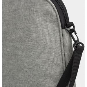 A grey satchel featuring a textured fabric and a black adjustable strap with a clip.