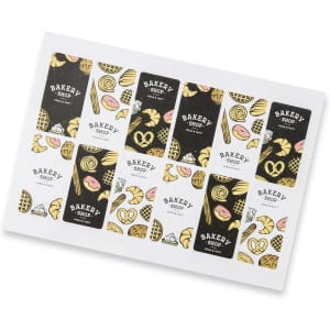 A rectangular matte sticker sheet featuring colourful bakery-themed designs and a logo.