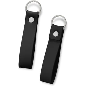 Two black leather key rings with silver metal fittings. Each has a snap button closure and key ring attachments.