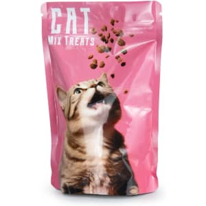A pink foil stand-up pouch with a cat graphic, containing mix treats for cats. Features a logo on the pouch.