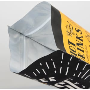A large foil stand-up pouch with a black and yellow design and resealable top. Features a logo.
