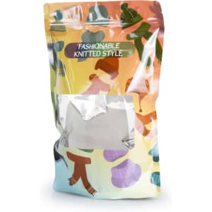 A large foil stand-up pouch with a colourful, knitted style design and a transparent window. It features a logo.