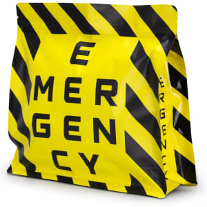A large, yellow and black foil flat bottom pouch with a logo and bold striped design.