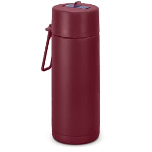 A drink bottle in a burgundy finish with a lid and handle, featuring a logo on the body.