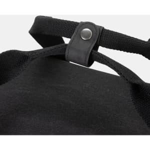 A black canvas cooler bag featuring sturdy straps and a snap button closure. It has a simple design with no visible branding.