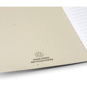 A soft cover notebook in a natural beige colour with lined pages and a logo indicating it's made from recycled paper.